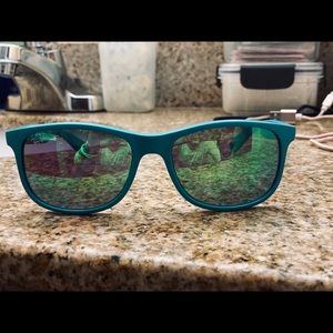 authentic ray-ban ‘andy’ turquoise sunglasses.